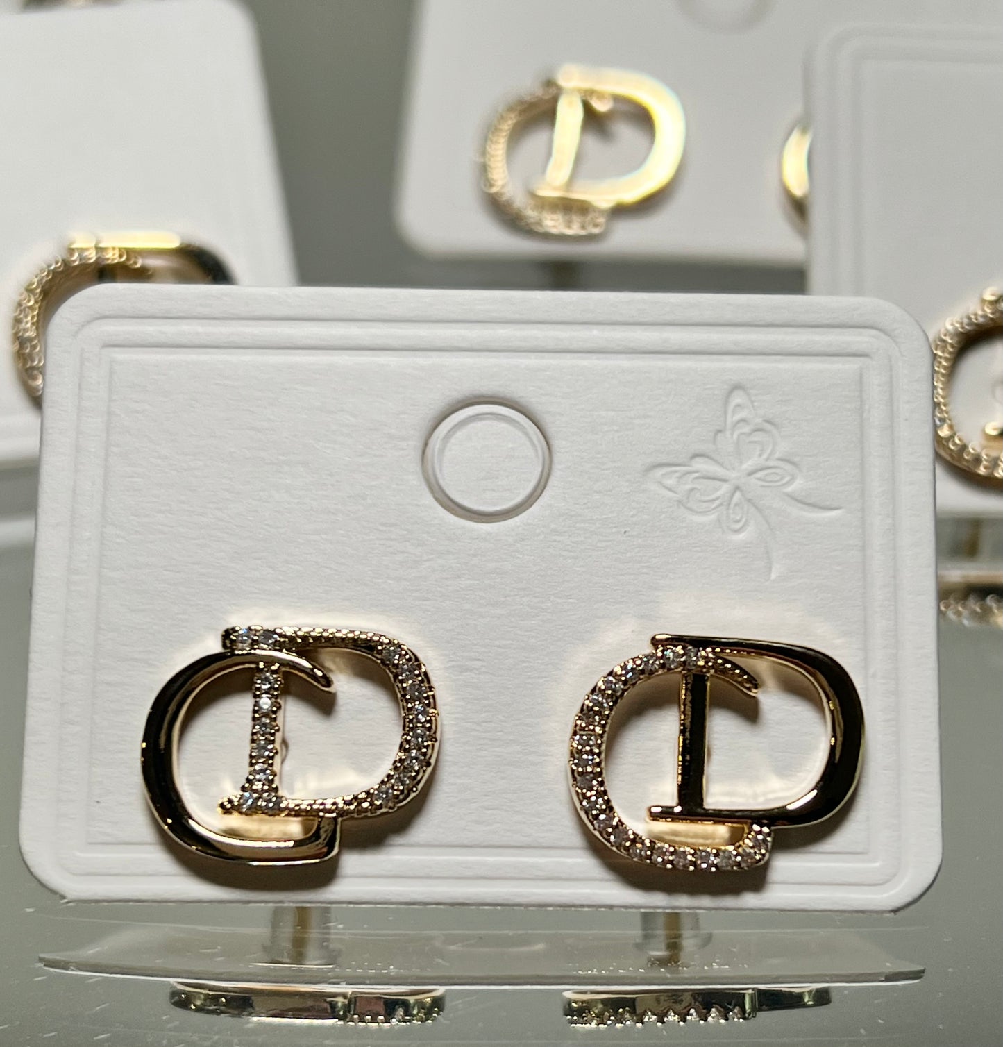 Gold stud earrings