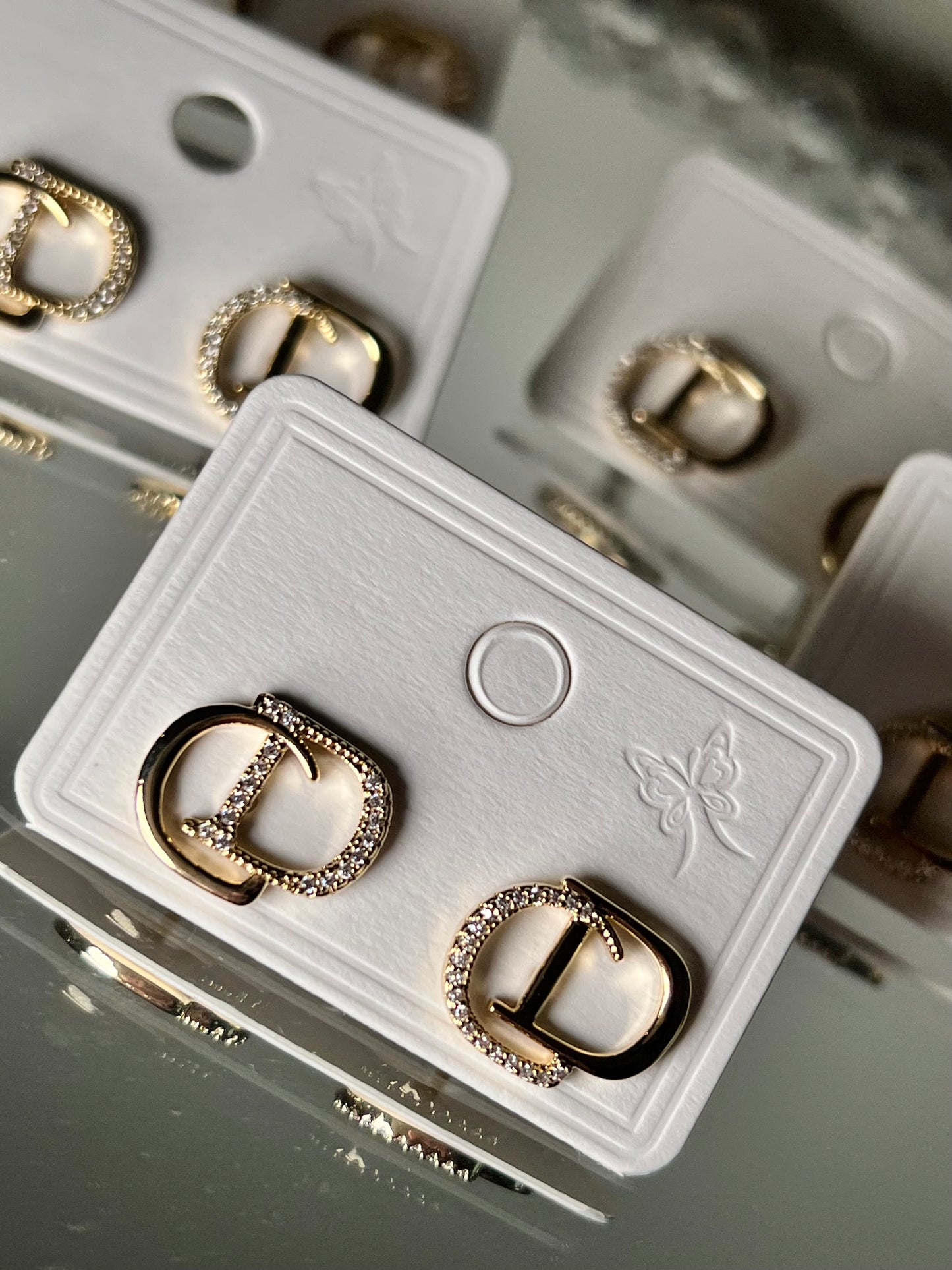 Gold stud earrings