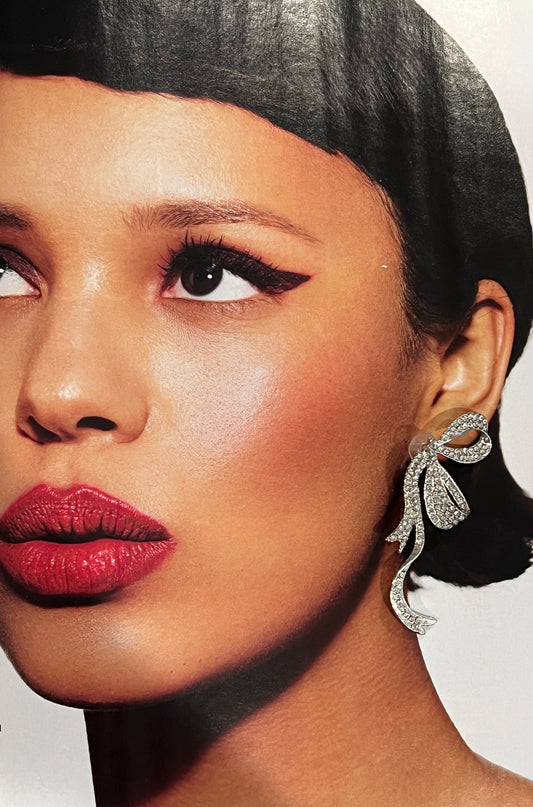 Side bow crystal earrings