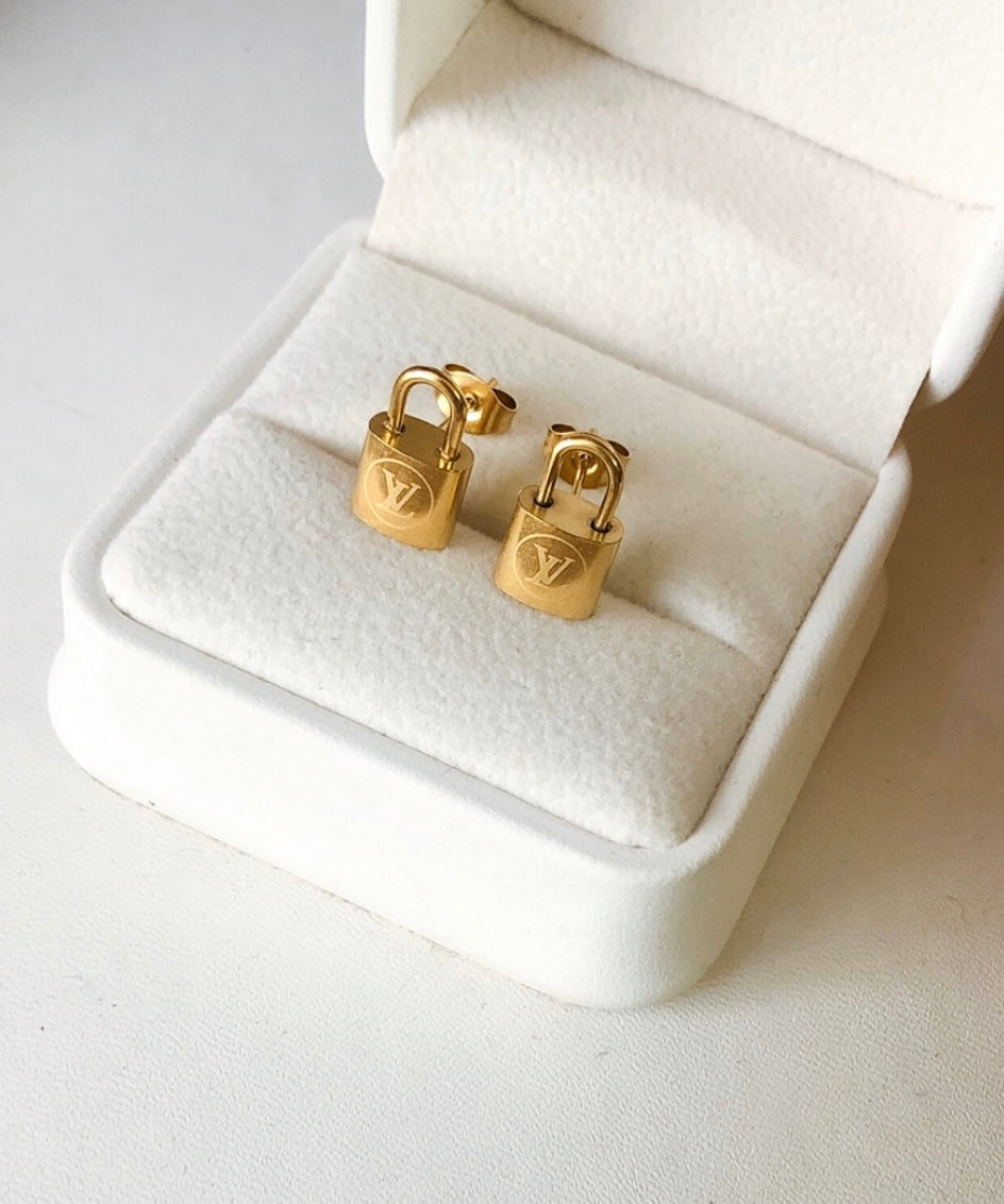 Gold lock earrings