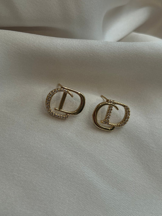 Gold stud earrings