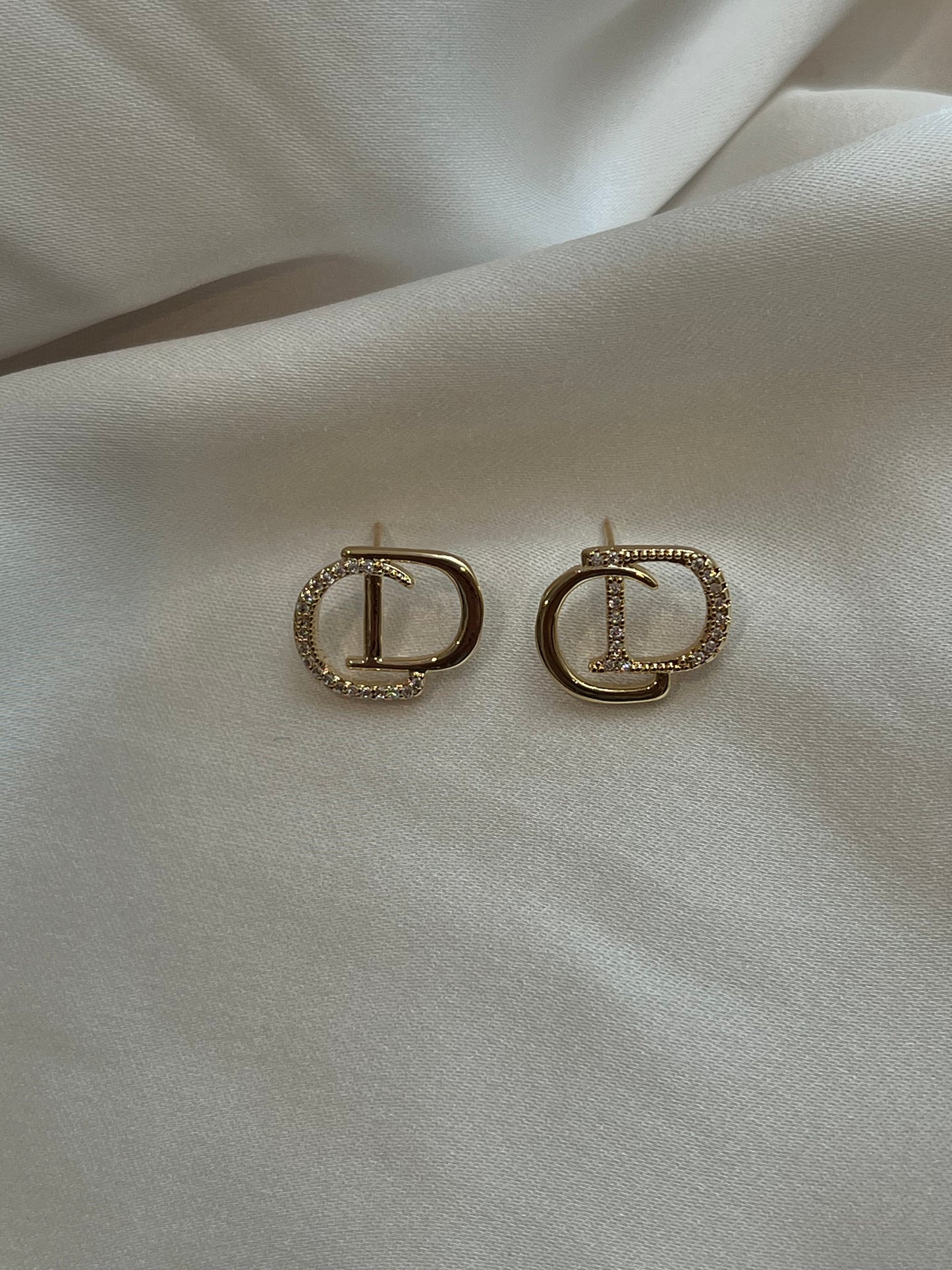 Gold stud earrings